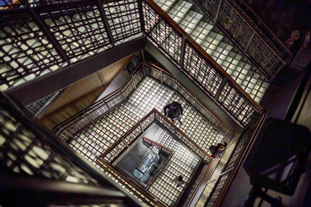 A multi-level staircase with glass pavers 